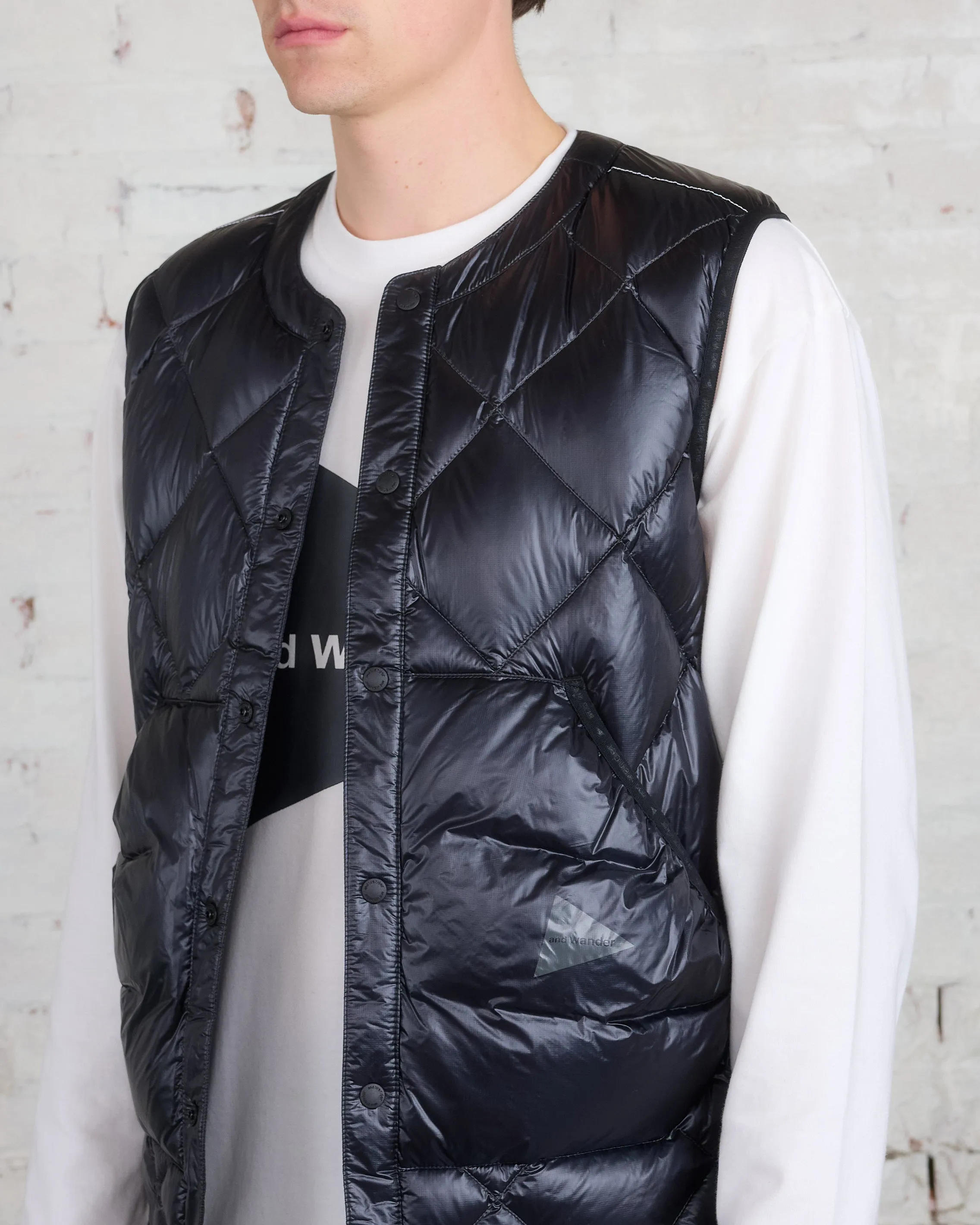 and wander Diamond Stitch Down Pertex Vest Black